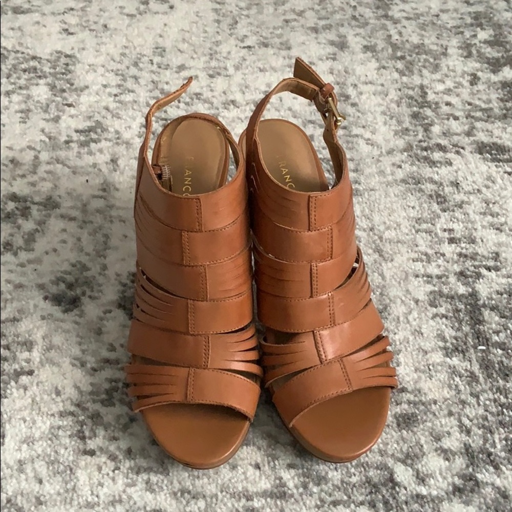 Brown strap heel.